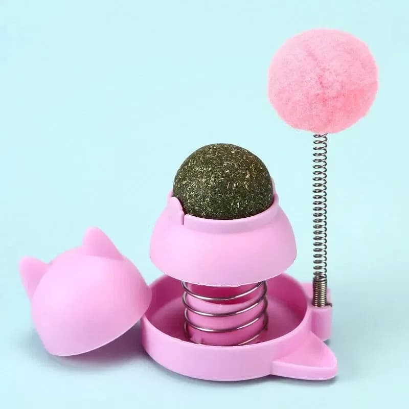 pink catnip ball cat toy with cover and pom-pom