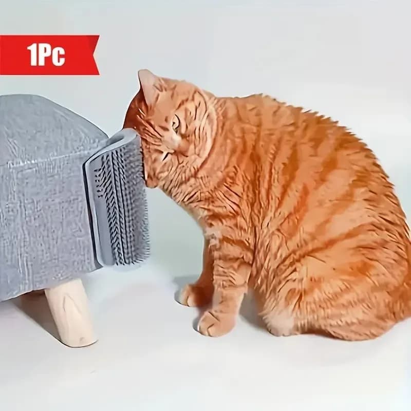 ginger cat rubbing on a cat corner self groomer fixed to furniture