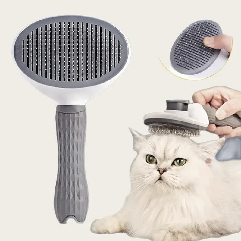 self cleaning slicker brush in grey used on a white cat