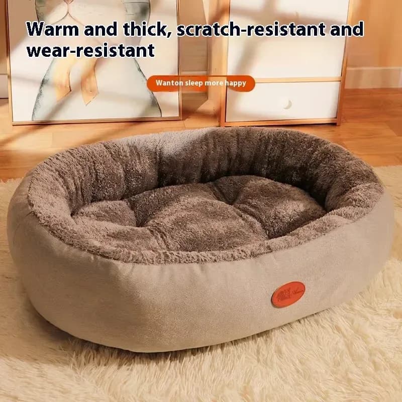 grey plush oval pet bed with raised rim