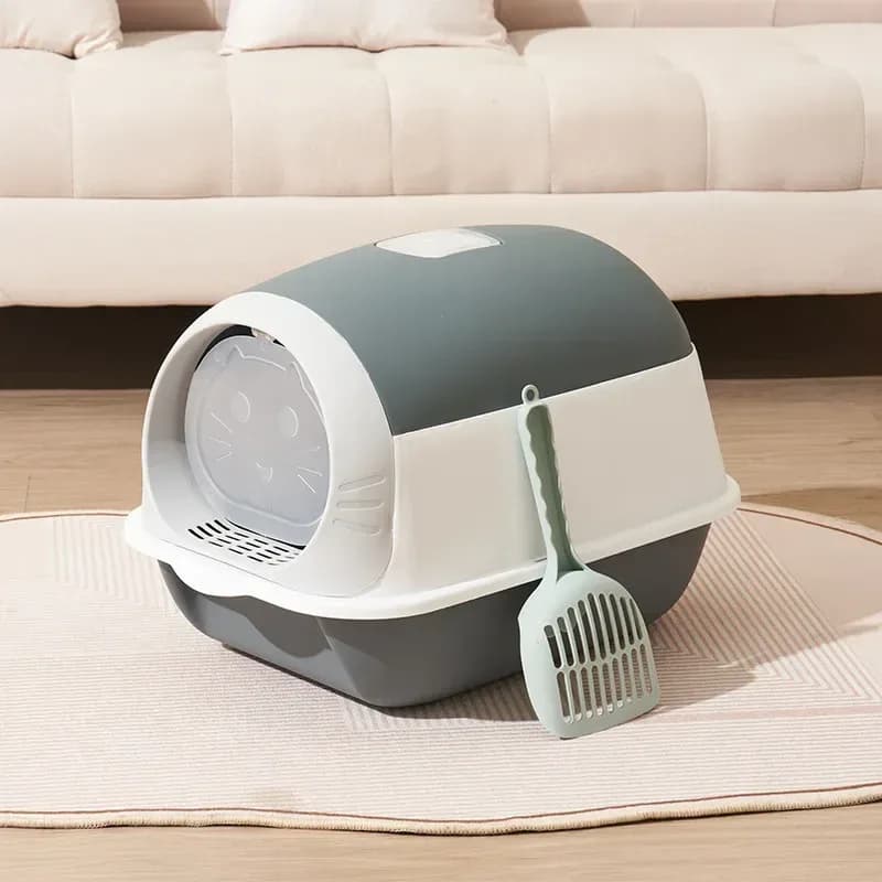 grey enclosed hooded cat litter box with flip door and scoop