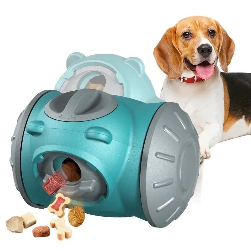 teal treat dispensing dog toy dropping kibble next to a beagle